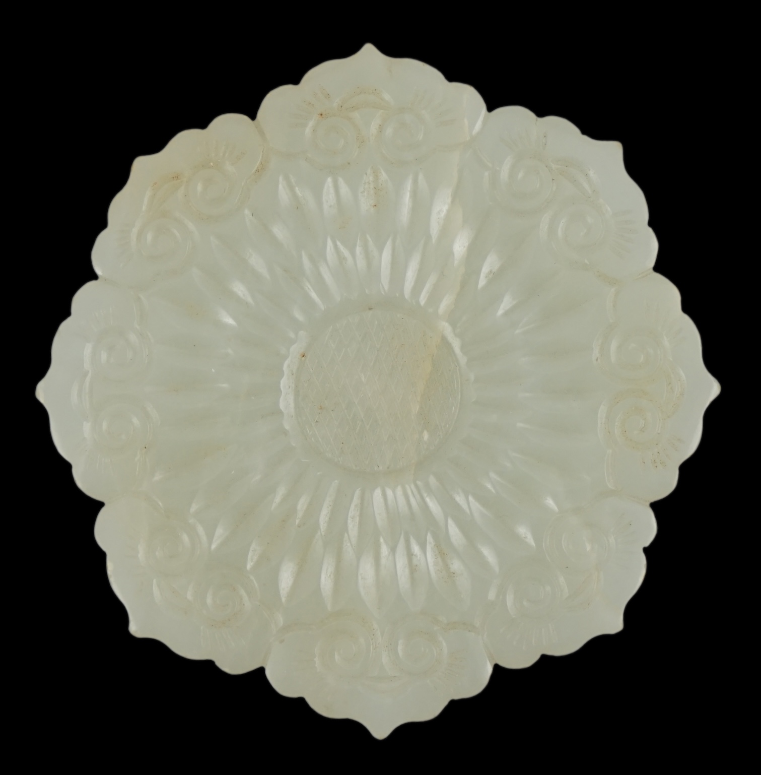 A Chinese pale celadon jade ‘mallow flower’ plaque, 18th/19th century